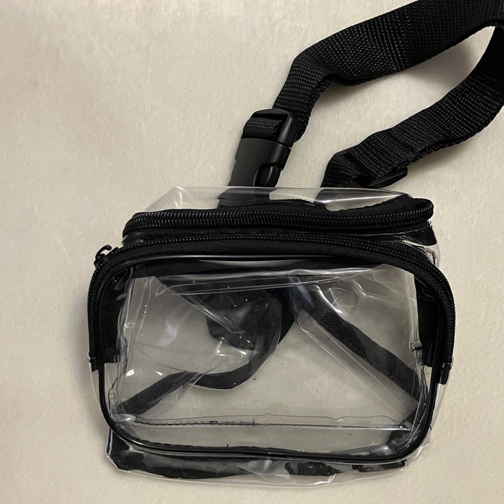 NWOT Clear Fanny Pack with Black Adjustable Strap. 2 zipper compartments